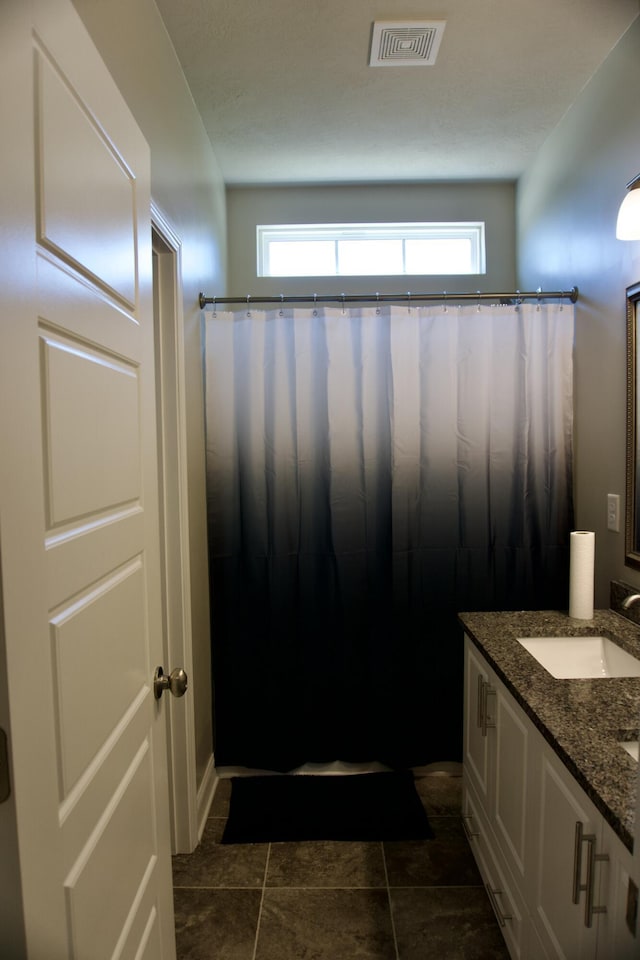 4042 Cottingham Way, Augusta, GA 30909 - full bathroom featuring vanity, a shower with shower curtain, and tile patterned floors