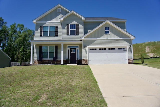 4042 Cottingham Way, Augusta, GA 30909 - craftsman house with board and batten siding, stone siding, covered porch, and concrete driveway