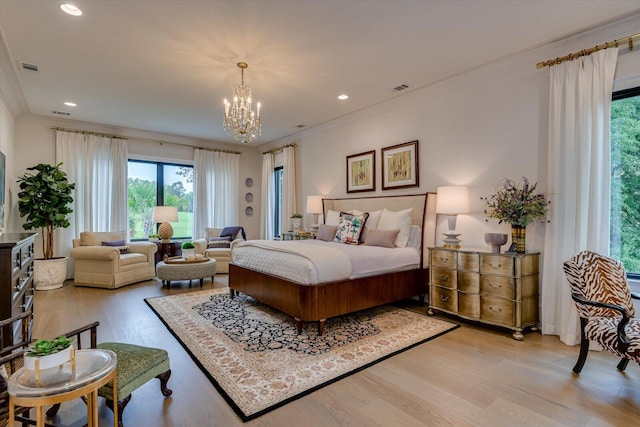 bedroom with recessed lighting, visible vents, ornamental molding, light wood finished floors, and an inviting chandelier