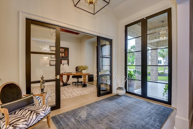 entryway featuring french doors and plenty of natural light