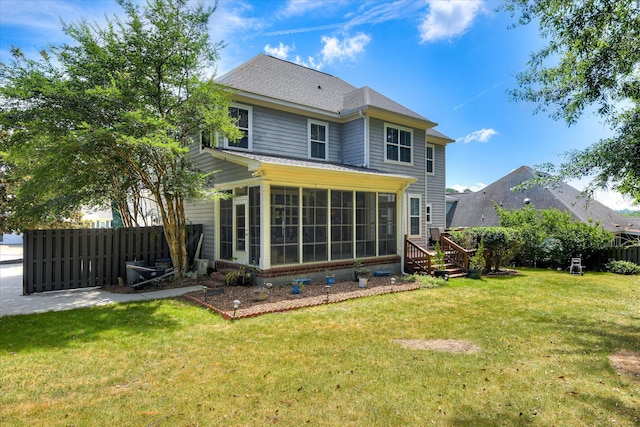 920 Napiers Post Dr, Evans, GA 30809 - back of property featuring a sunroom and a shingled roof