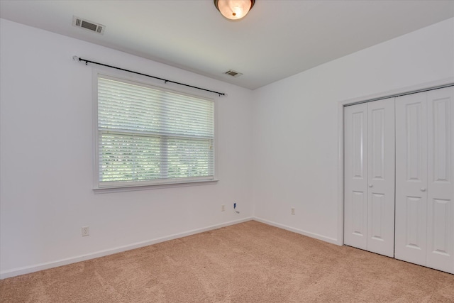920 Napiers Post Dr, Evans, GA 30809 - unfurnished bedroom featuring light colored carpet and a closet