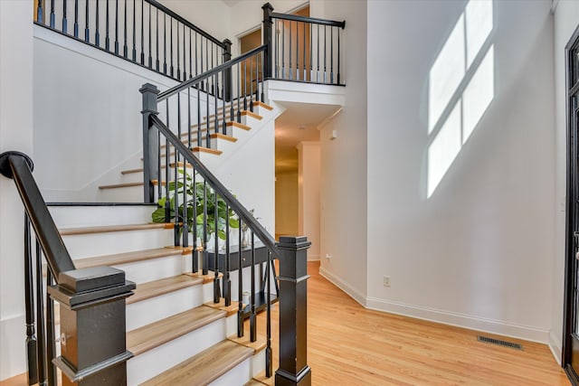 920 Napiers Post Dr, Evans, GA 30809 - staircase with wood finished floors and a towering ceiling