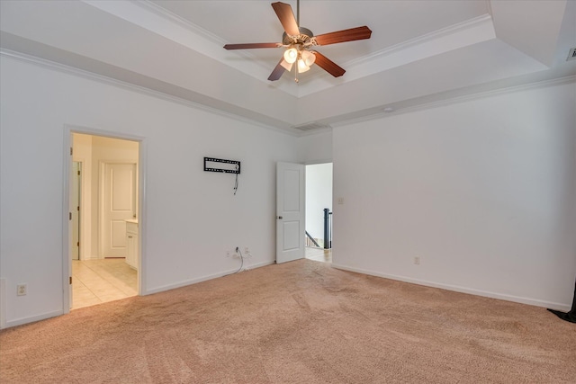 920 Napiers Post Dr, Evans, GA 30809 - empty room featuring a raised ceiling, light colored carpet, crown molding, and a ceiling fan