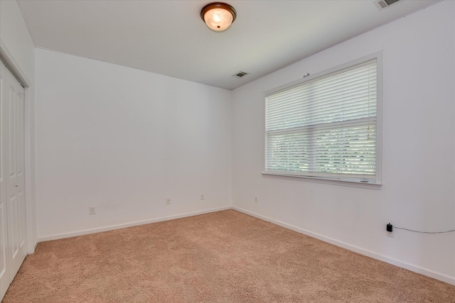 920 Napiers Post Dr, Evans, GA 30809 - unfurnished bedroom featuring light carpet and a closet