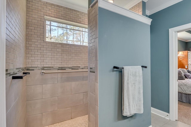 bathroom with tiled shower, ensuite bath, baseboards, and ornamental molding