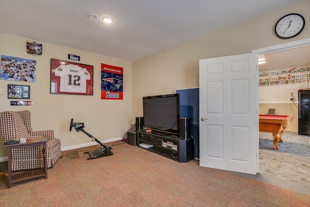 interior space with baseboards and carpet