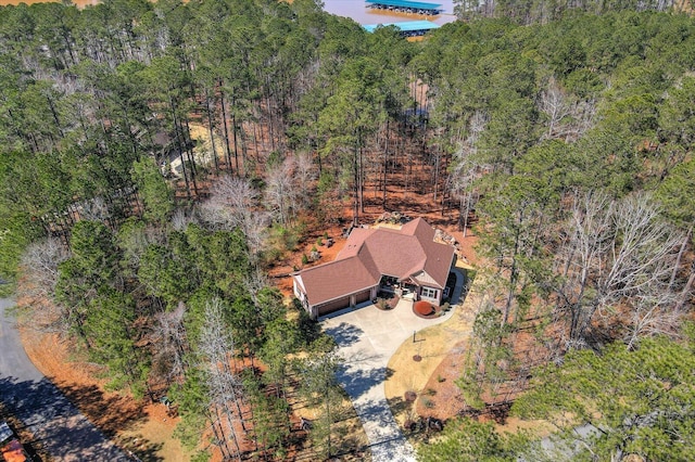 bird's eye view featuring a view of trees