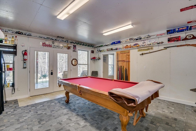 game room featuring tile patterned floors, french doors, carpet flooring, and pool table