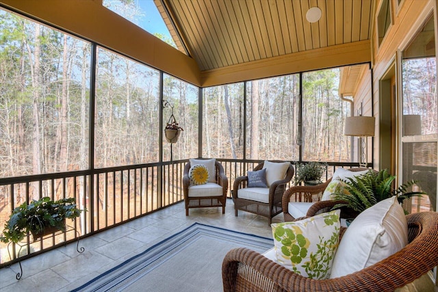 sunroom with lofted ceiling