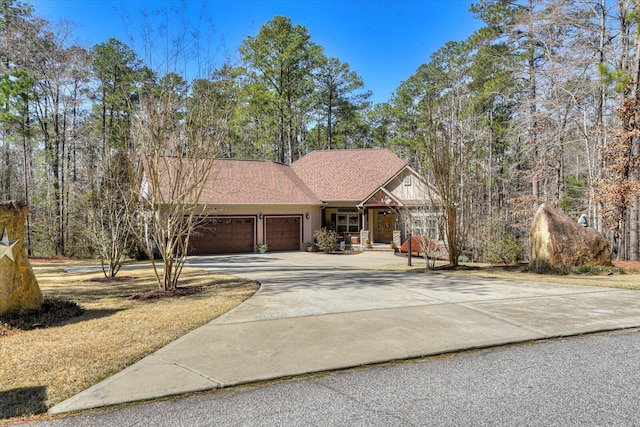 view of front facade with driveway and an attached garage