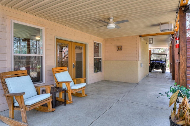 view of patio featuring ceiling fan