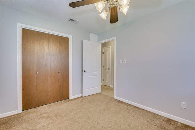 307 Candlewood Dr, Martinez, GA 30907 - unfurnished bedroom with carpet floors, baseboards, a closet, and ceiling fan