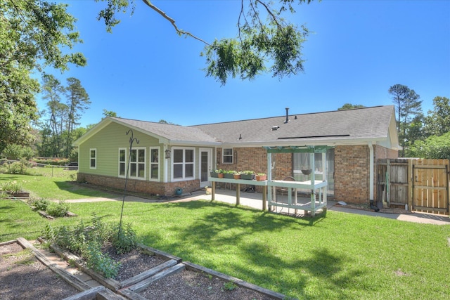307 Candlewood Dr, Martinez, GA 30907 - back of property with brick siding, a patio, and roof with shingles