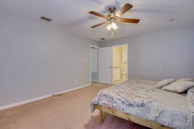 307 Candlewood Dr, Martinez, GA 30907 - bedroom featuring light colored carpet, baseboards, ceiling fan, and connected bathroom