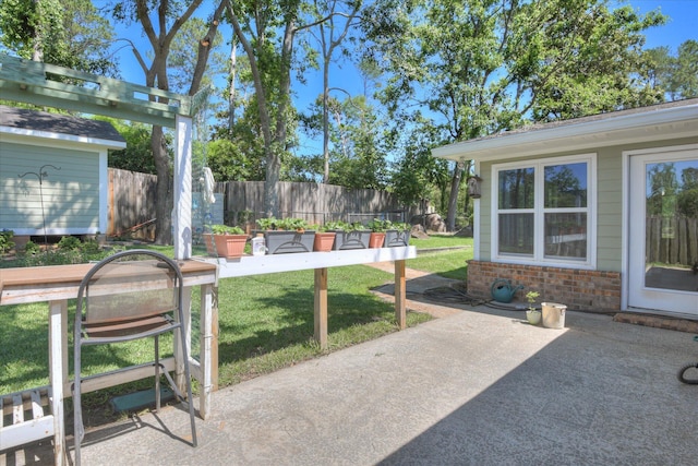 307 Candlewood Dr, Martinez, GA 30907 - view of yard featuring a patio area and an outbuilding