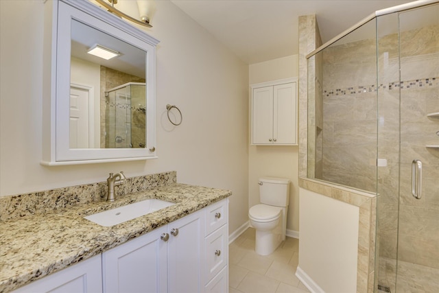 307 Candlewood Dr, Martinez, GA 30907 - full bath featuring vanity, toilet, a stall shower, tile patterned floors, and baseboards