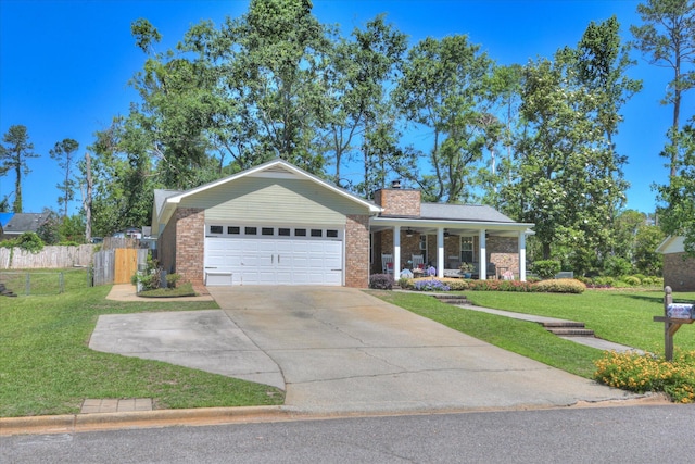 307 Candlewood Dr, Martinez, GA 30907 - single story home featuring covered porch, a chimney, brick siding, driveway, and an attached garage