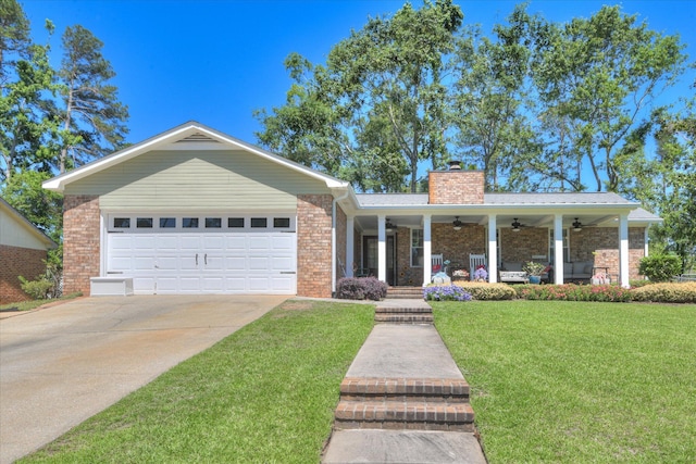 307 Candlewood Dr, Martinez, GA 30907 - ranch-style home with a ceiling fan, a front lawn, a chimney, a garage, and brick siding