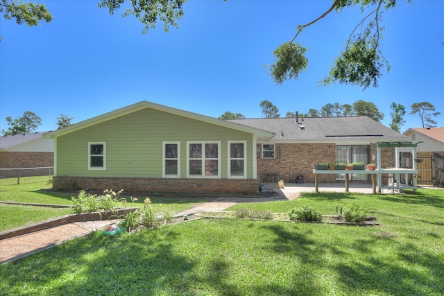 307 Candlewood Dr, Martinez, GA 30907 - rear view of property with brick siding and a patio