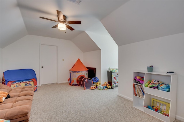 playroom featuring carpet, vaulted ceiling, and a ceiling fan