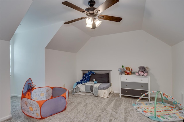 playroom with carpet floors, lofted ceiling, a ceiling fan, and baseboards