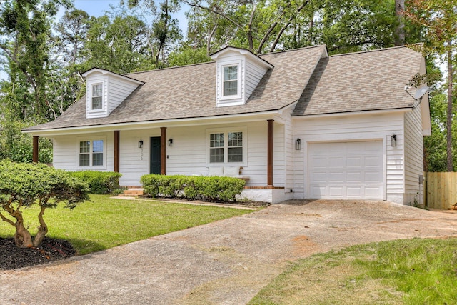 cape cod-style house with concrete driveway, a garage, and roof with shingles