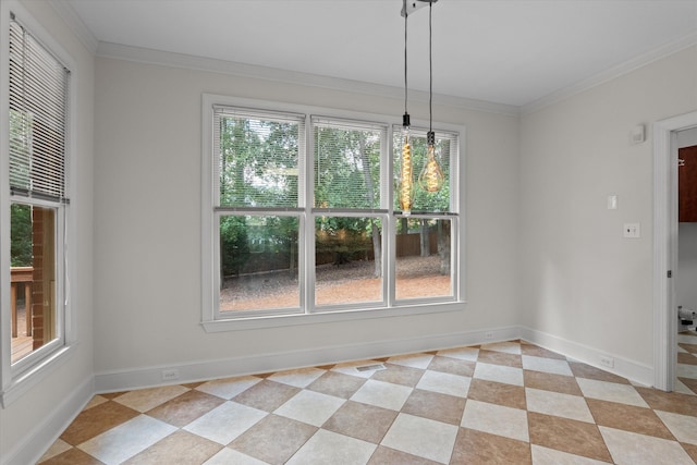 unfurnished dining area with baseboards, ornamental molding, and light tile patterned floors