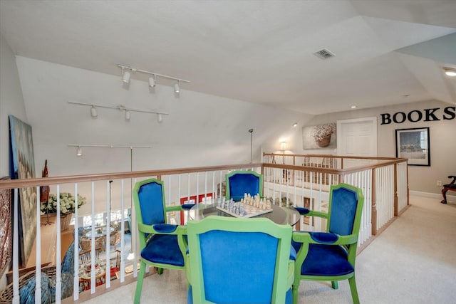 playroom featuring visible vents, carpet, and vaulted ceiling