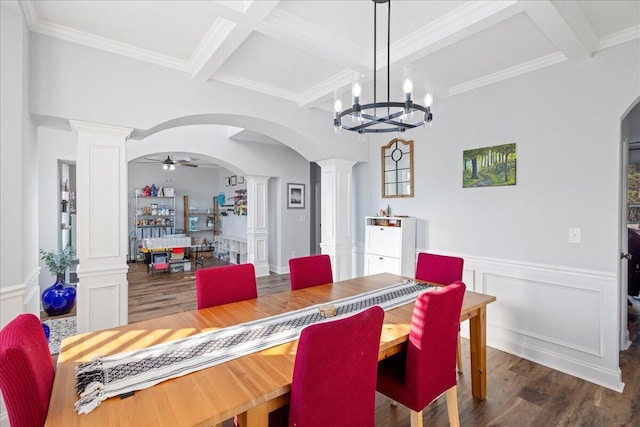 dining room with beam ceiling, ornate columns, coffered ceiling, dark hardwood / wood-style flooring, and ceiling fan with notable chandelier