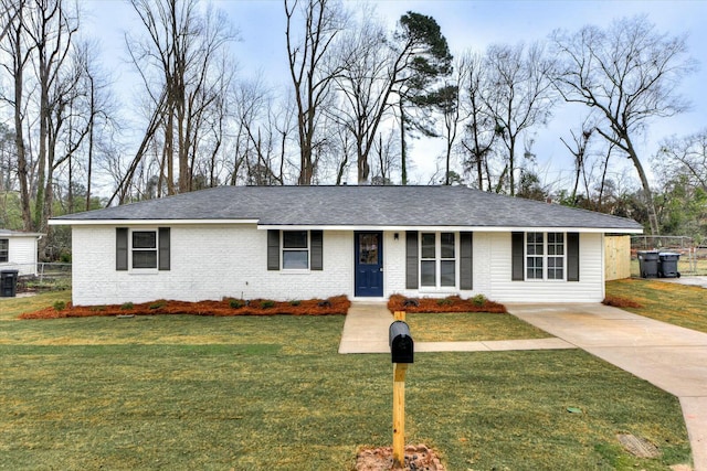 single story home featuring a front yard and central AC unit