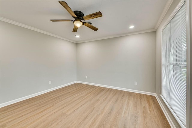 unfurnished room with ornamental molding, ceiling fan, and light wood-type flooring