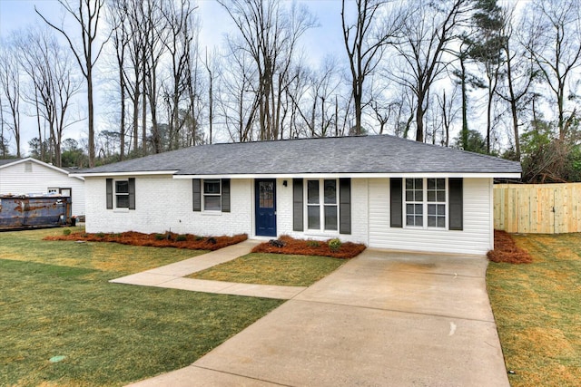 ranch-style home with a front lawn