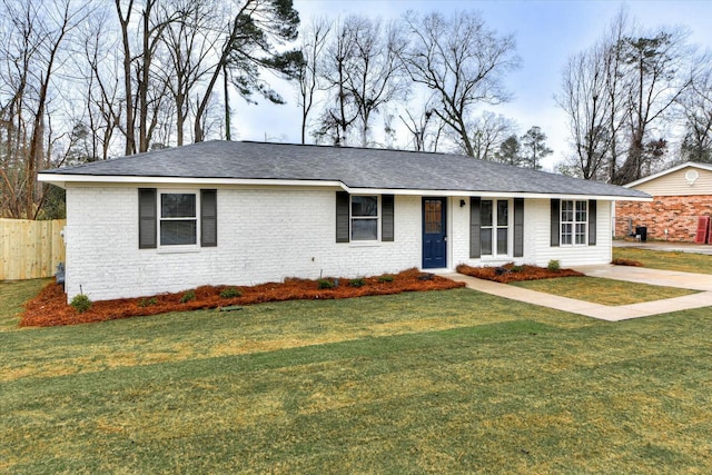 single story home with a front yard