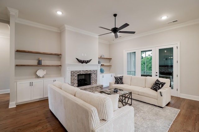 477 Rivernorth Dr, North Augusta, SC 29841 - living area featuring ceiling fan, ornamental molding, dark wood-type flooring, a brick fireplace, and recessed lighting