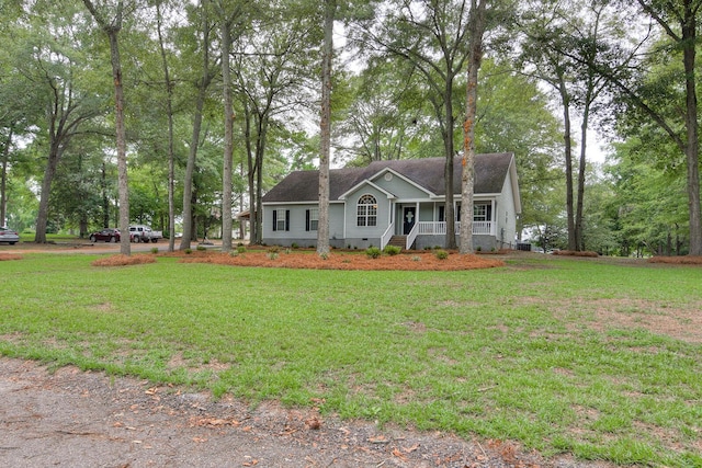 view of front of house featuring a front yard and a porch