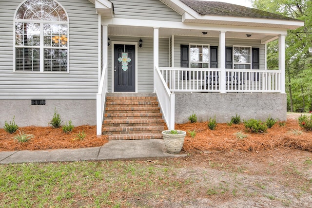 property entrance featuring a porch