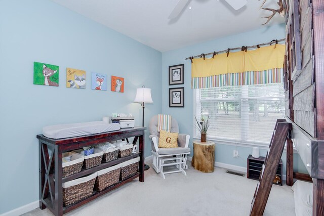 interior space featuring carpet and ceiling fan