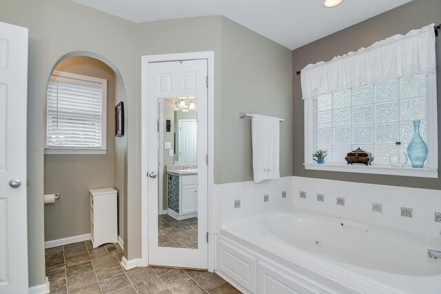 bathroom featuring a bathtub and vanity