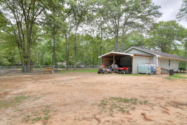 view of yard featuring a carport