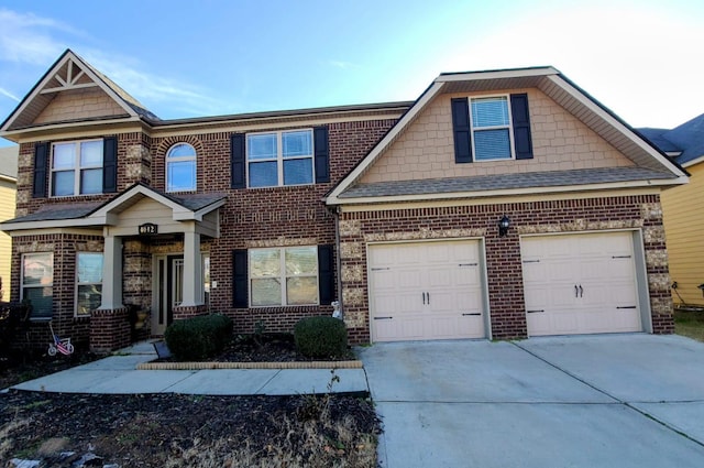 craftsman house with a garage