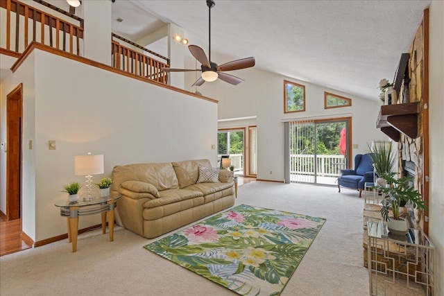 3736 Winchester Trl, Martinez, GA 30907 - living room with ceiling fan, carpet flooring, and high vaulted ceiling