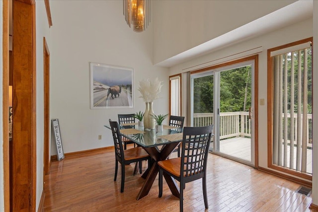 3736 Winchester Trl, Martinez, GA 30907 - dining room with light wood-style floors and a high ceiling