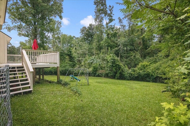 3736 Winchester Trl, Martinez, GA 30907 - view of grassy yard featuring stairs, a playground, and a wooden deck