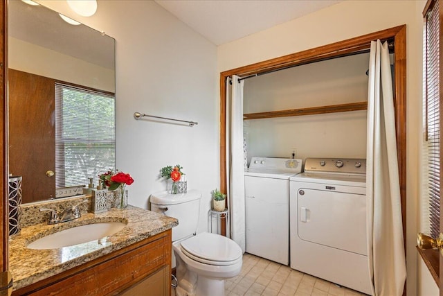 3736 Winchester Trl, Martinez, GA 30907 - bathroom featuring independent washer and dryer, vanity, and tile patterned flooring