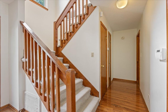 3736 Winchester Trl, Martinez, GA 30907 - stairs featuring wood finished floors