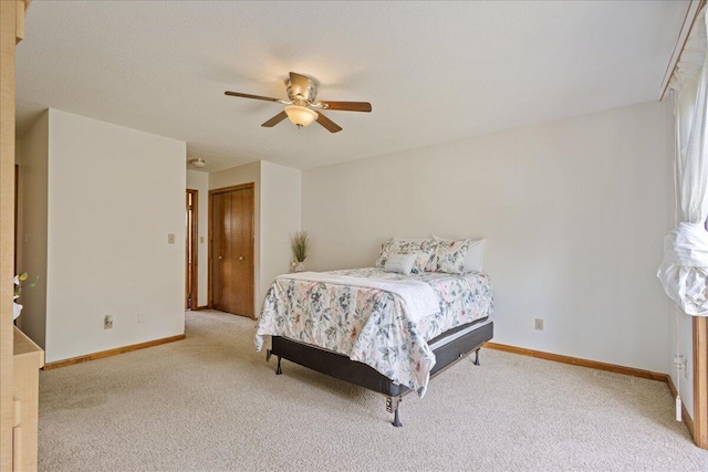 3736 Winchester Trl, Martinez, GA 30907 - bedroom with light carpet, ceiling fan, and a closet