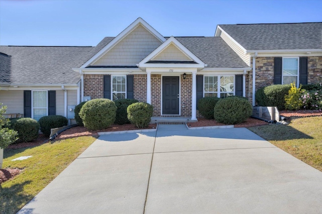 view of front of home with a front yard