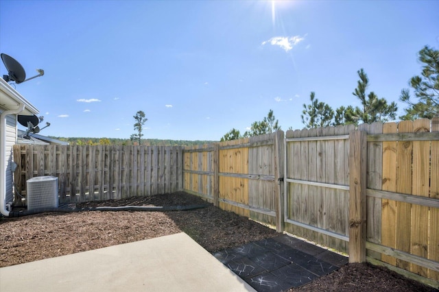 view of yard with central AC unit