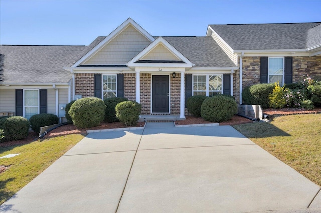 view of front of home with a front lawn